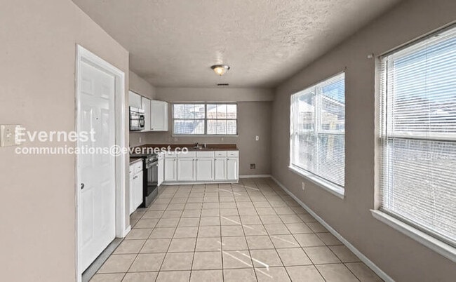 Photo - 3 Bed, 2.5 Bath Home with Fenced Yard & Garage / Pet-Friendly / Available Now!