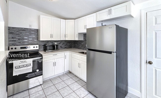 Photo - 1906 E 98th Ave