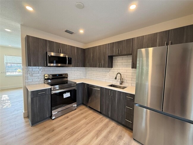 Building Photo - 1243 NW 25th St Unit 1243 Rental