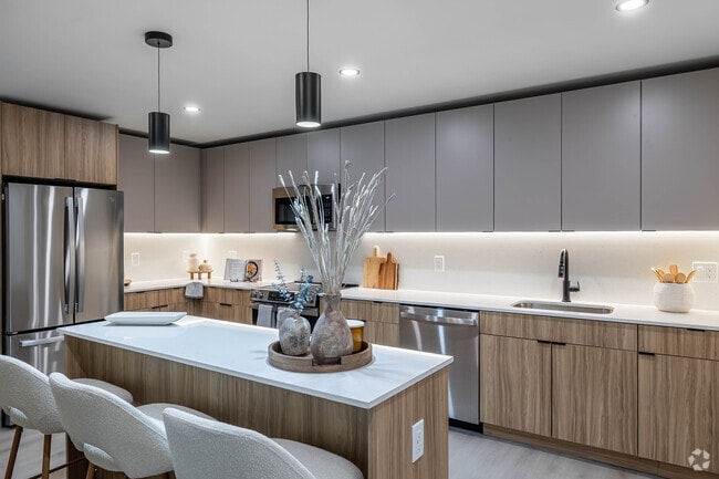 1 BR, 1 BA - 835SF - - Kitchen - Village Crossing