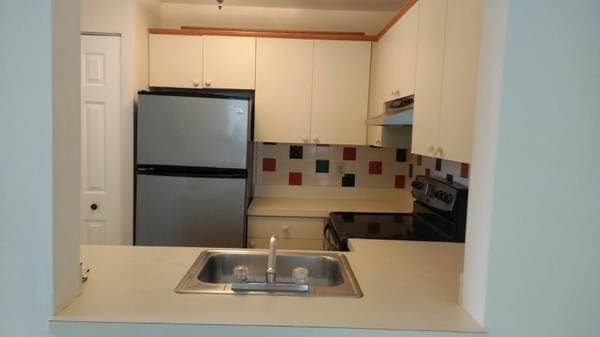 Building Photo - 14917 SW 104th St Unit 14