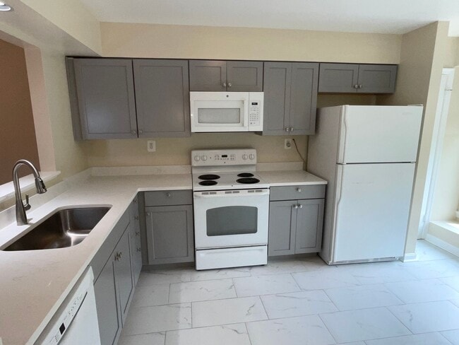 Photo - Gorgeous 3BR 2 full bath, 2 half bath end unit townhome located in the Woodmont Place community o...