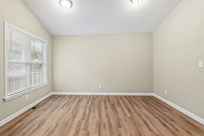 Photo - Welcome to this charming 4 bedroom, 2 bathroom home located in Greensboro, NC.