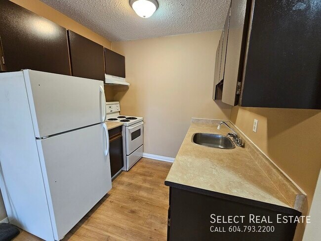 Photo - 33924 George Ferguson Way Unit 305