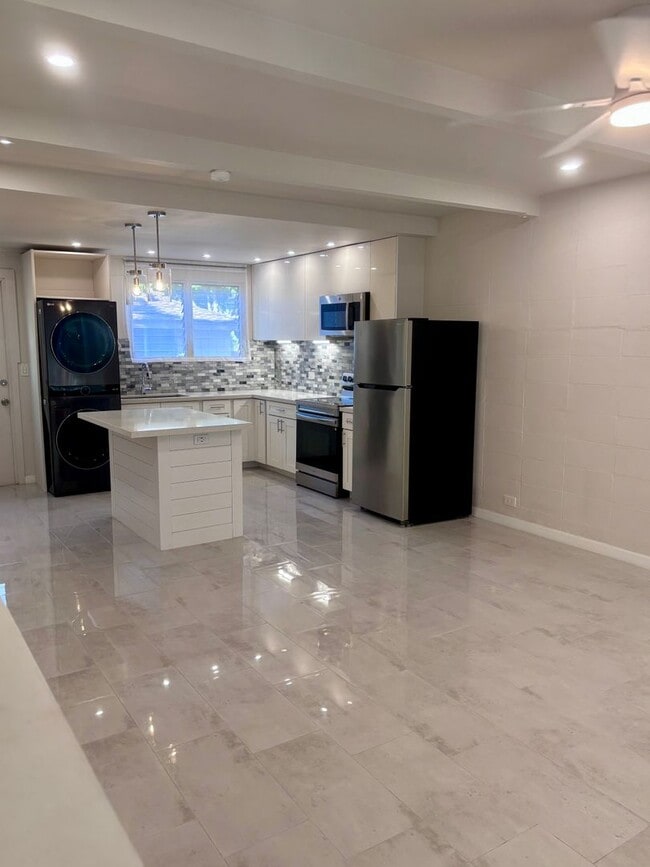 Photo - Available Now | 2 Bedroom, 2 Bathroom Townhouse with 1 Assigned Parking Stall at Tropic Gardens 1