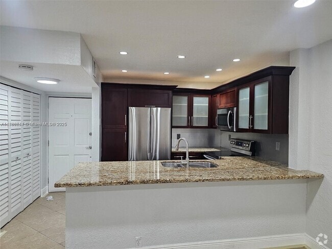 Building Photo - 4140 NW 90th Ave Unit 202 Rental