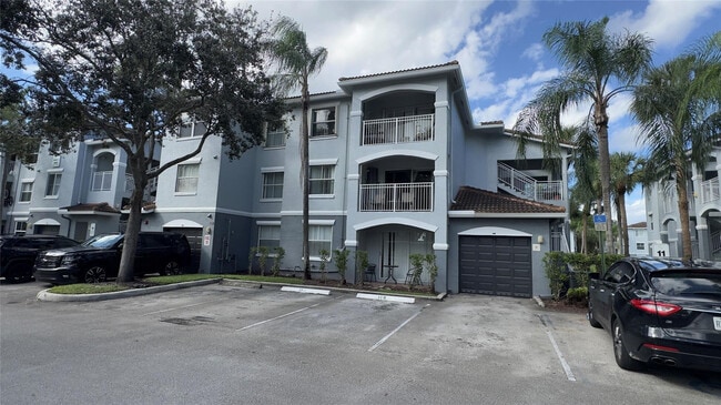 Building Photo - 9625 NW 1st Ct Unit 11-306