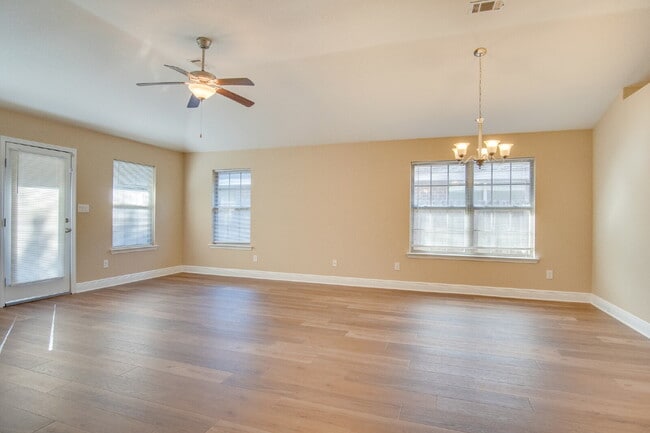 Photo - Spacious Brick 3BR/2BA Home with Open Floor Plan, Primary Suite, 2-Car Garage & Fenced Backyard N...