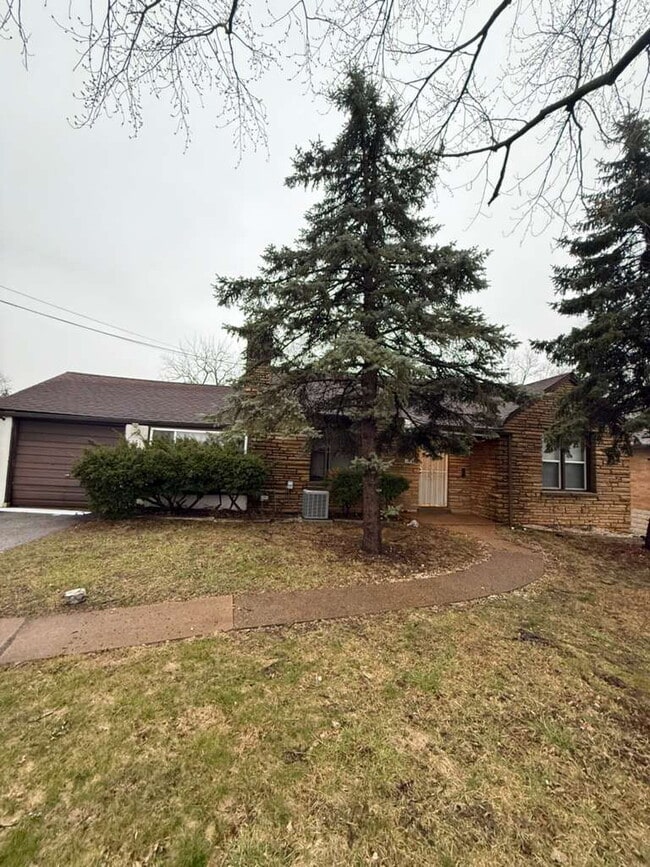 Photo - "Cozy 2-Bedroom, 1 bath Retreat with Fireplace Charm!"  One car garage, section 8 ok.