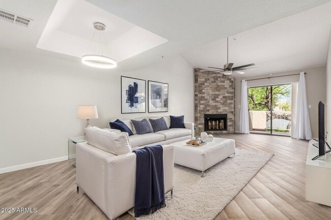 Building Photo - 9460 E Mission Ln Unit 211