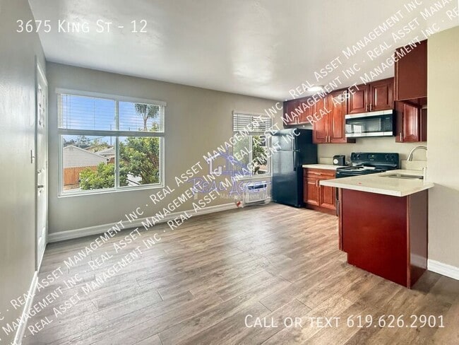 Building Photo - 3675 King St Unit 12