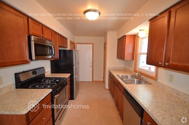 Building Photo - 5900 Aquila Ave N Rental