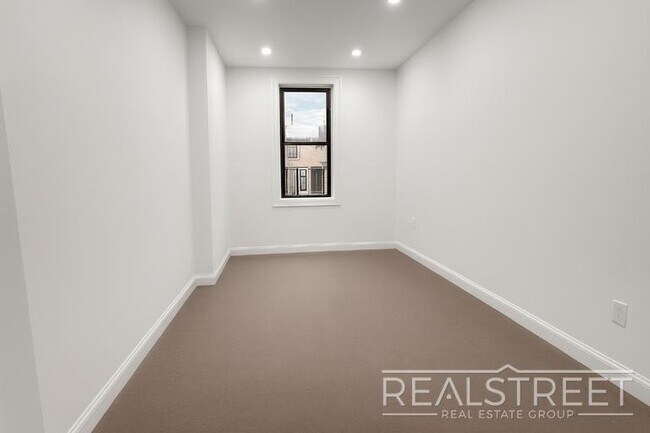 Photo - Spacious 2-Bedroom, 2-Bath Apartment in Bed-Stuy with Modern Amenities