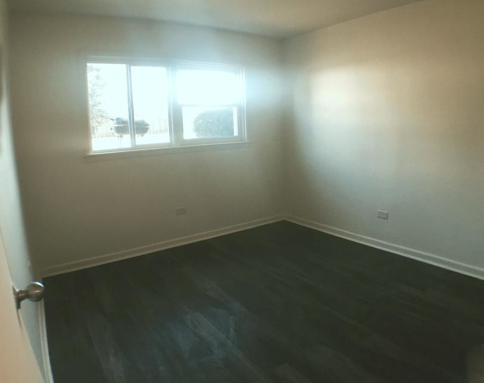 Bedroom 1 - 9709 W Lorraine Dr Apartment