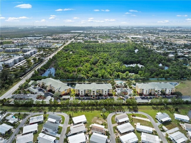 Building Photo - 11041 Gulf Reflections Drive Unit 306