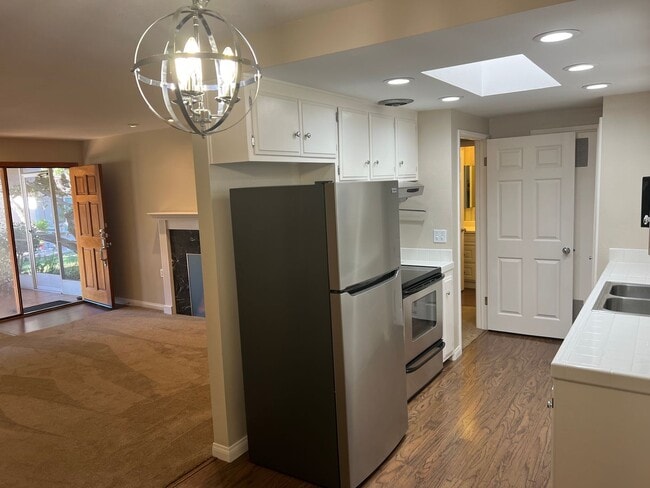 Photo - 55+ ONLY community gorgeous ranch style 2BR/2BA home with laundry, parking and community amenities