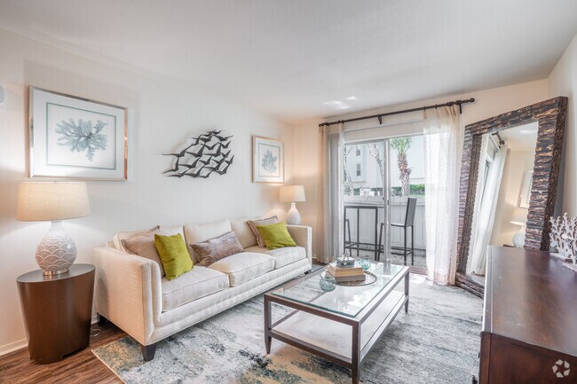 1BR, 1BA - 645SF - Living Room - Village by the Sea