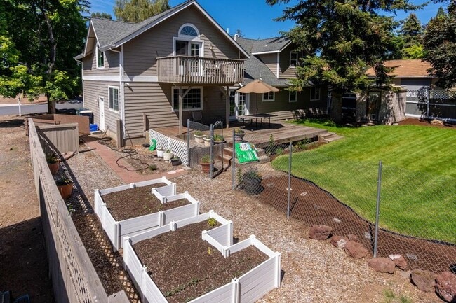 Photo - Wonderful home on large corner fenced lot in desired mid-town with views!