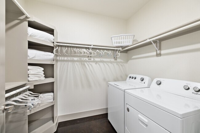 Model Cloest with Full Washer and Dryer