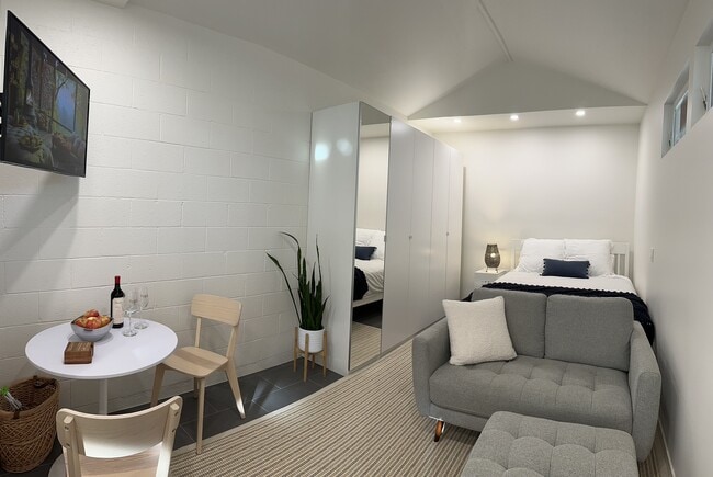 Comfortable kitchen table and chairs, love seat for watching TV, queen bed. - 6353 W 84th St Unit New  Guesthouse