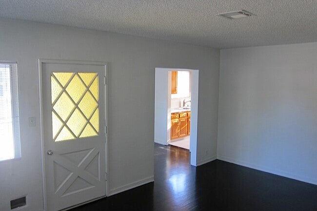 Living Room looking into dining room and kitchen - 4927 Forman Ave