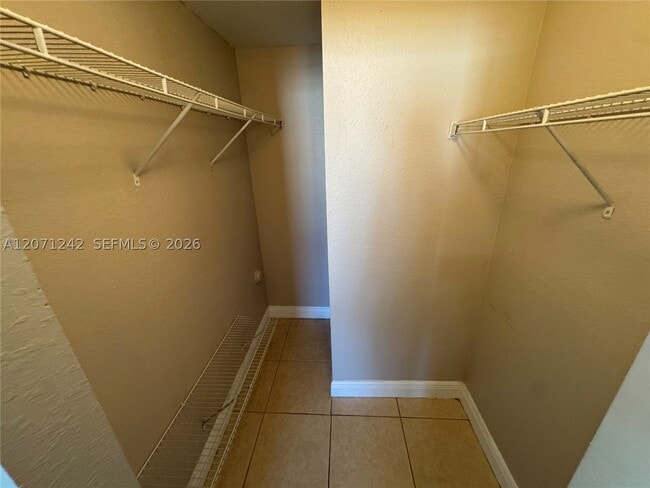 Building Photo - 6940 NW 179th St Unit 404-7