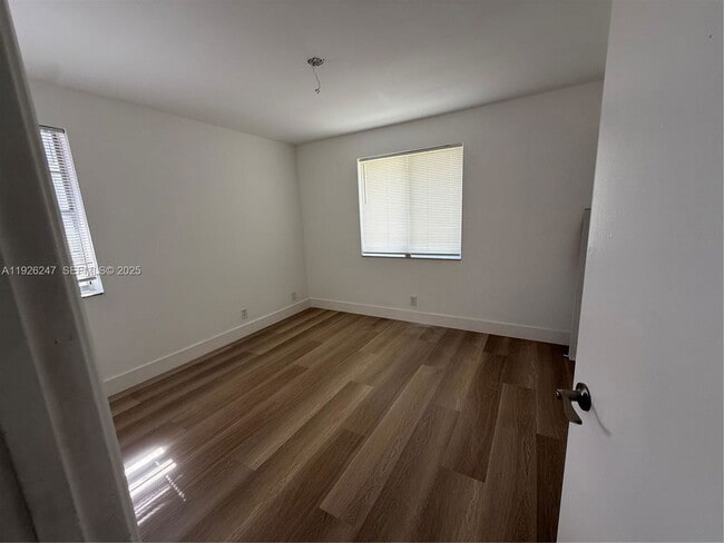 Building Photo - Woodgate Court, Sunrise, FL 33326 - 3 BR 2 BA villa