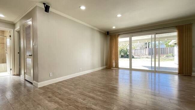 Photo - 4BD/3BA - Modern Home in Convenient Location: Updated Features, Near Parks & Shops, Pet-Friendly ...
