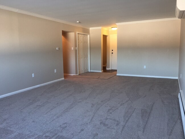 Living room looking towards entry door - 3643 N Front St Unit C