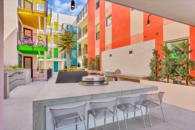 Community outdoor kitchen with BBQ and Hibachi grill.