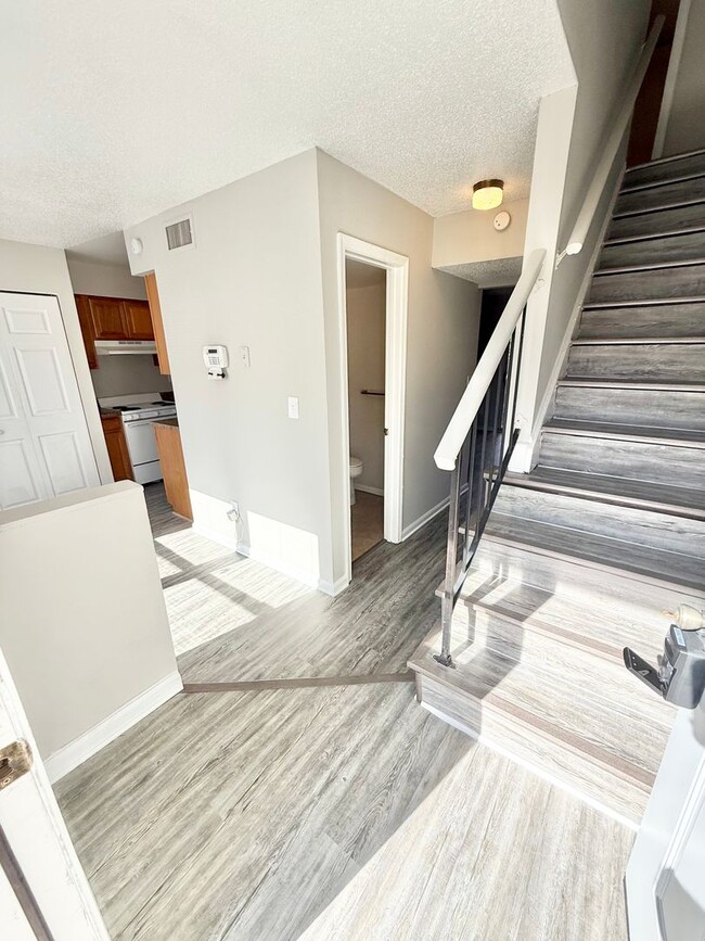 Photo - *** RENT READY!! Newly remodeled townhome! ALL Laminate.