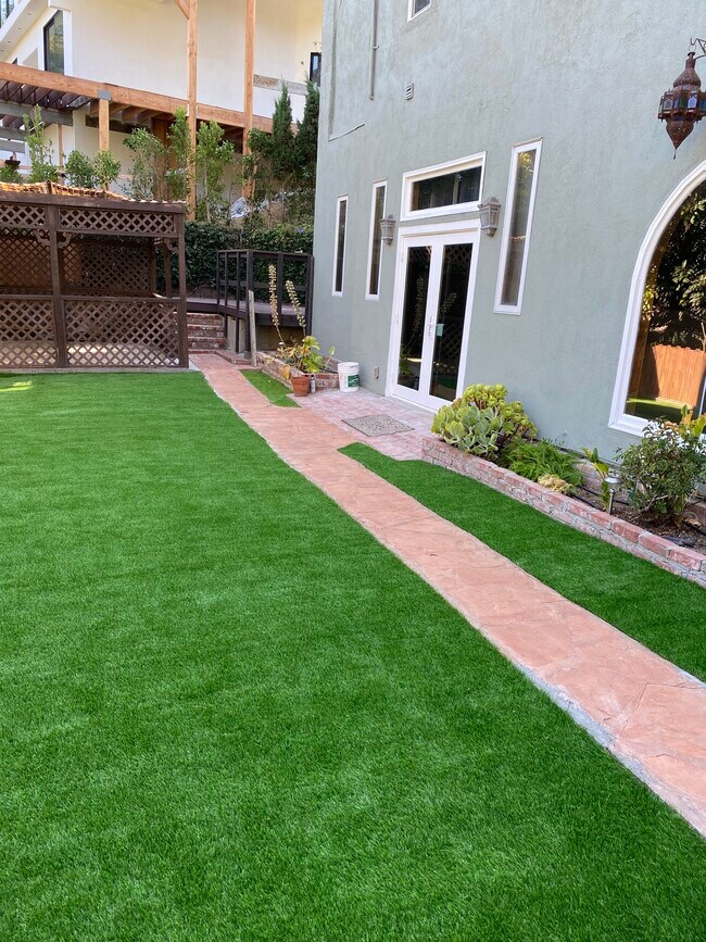 Private yard with deck and gazebo - 6206 Temple Hill Dr Apartments Unit Lower