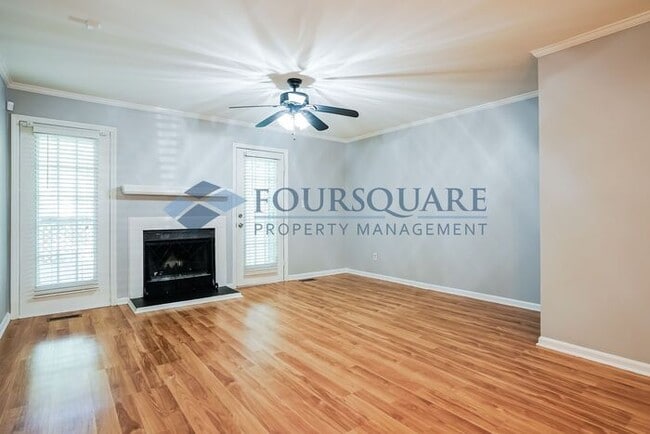 Photo - Bright 2-Bed / 2.5-Bath Townhome with Fireplace, Back Deck & Open Living – Convenient to Cary
