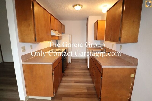 Building Photo - 3712 S Kelly Ave Unit # 5