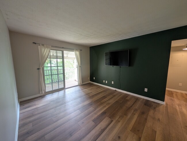 Cozy living room - empty view (TV not included) - 3140 7 Pines Ct NW Unit 302
