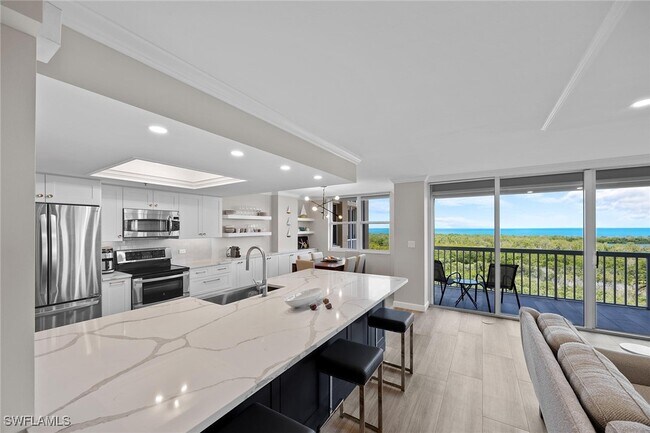 Building Photo - 6585 Nicholas Blvd Unit 805