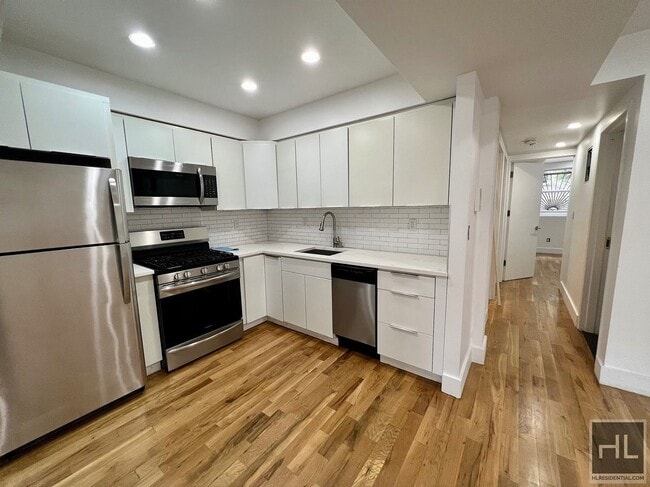 Photo - 2BR 1BA Townhouse Private Garden & In-Unit Laundry on Ocean Hill Bushwick Border Unit 1