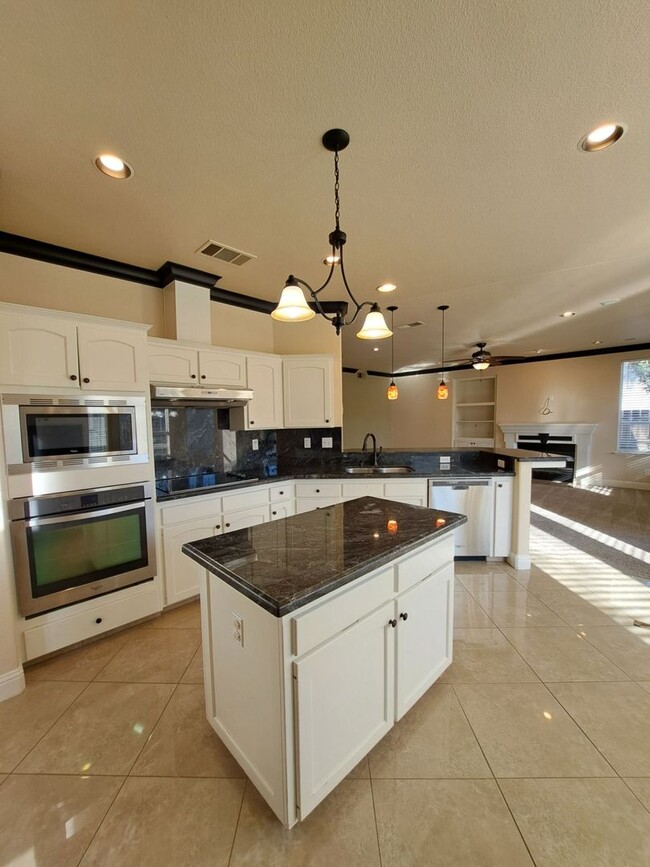 Photo - Spacious 5-Bedroom Fresno Home with Garage and Backyard!