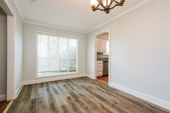 Photo - 4 BR/2BA | Updated Single Family Home | Gorgeous hardwoods | Storage attic!