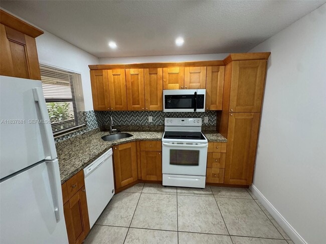 Photo - 3817 Cocoplum Cir Unit 3585
