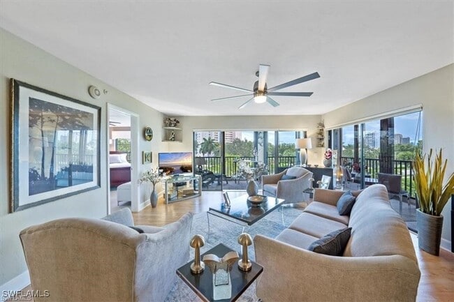 Building Photo - 6080 Pelican Bay Blvd Unit A-401 Rental