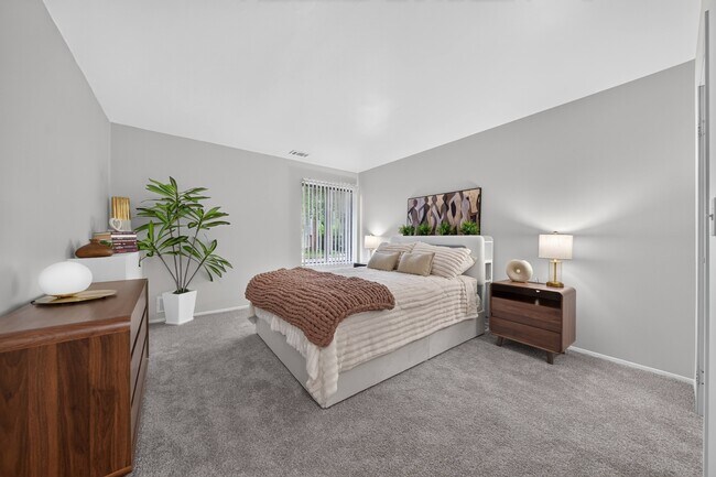 Cozy bedroom with ample storage at Park Lane Apartments in Southfield, MI.