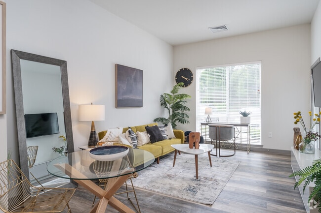 1BR 1BA - 778SF Living Room - The Flats at Kennett Square