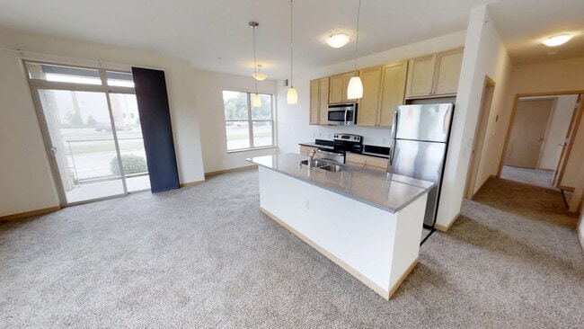 Apartments feature GE stainless steel appliances, granite countertops, and more - Tyberius Terrace Apartments