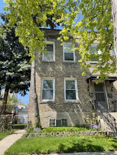 Building Photo - 6110 N Albany Ave Unit 1