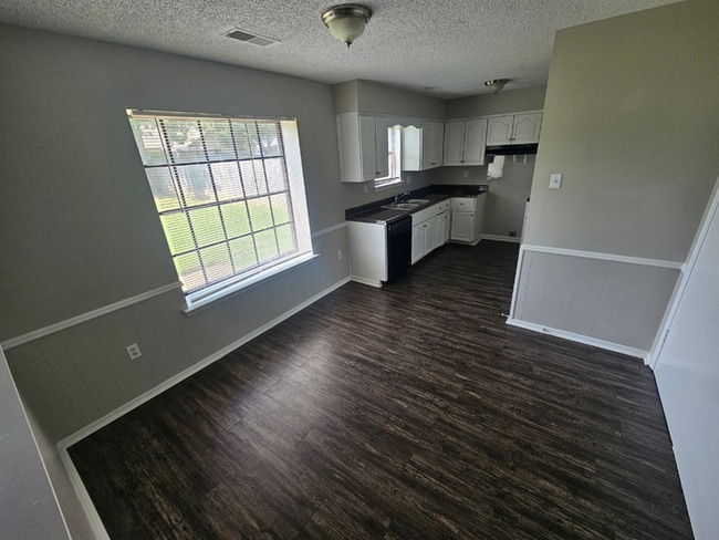Photo - PREMIUM RENTAL! 3BR/2BA | Stone Fireplace & Hardwoods | Fenced Yard!
