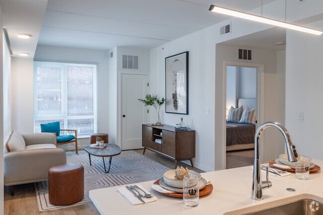 1BR, 1BA - 790SF - Kitchen and Living Room - 202 Queen