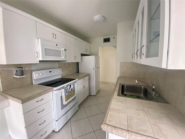 Photo - 6061 Collins Ave Unit 17B