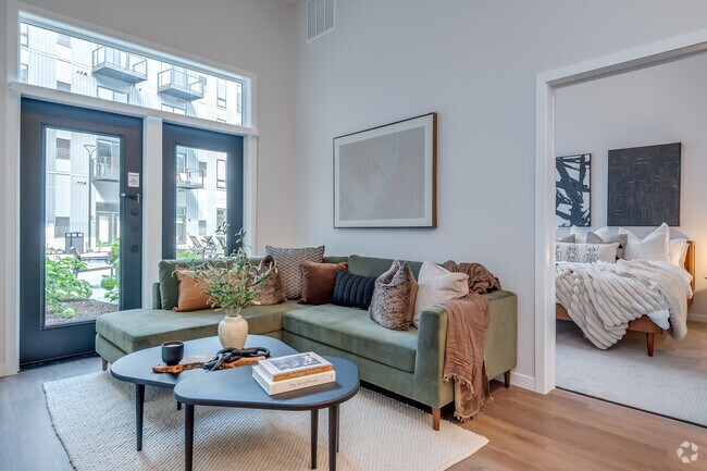 2BR, 2BA - 1,000SF - Living Room - Evoni