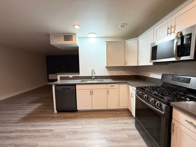 Photo - Updated 3-Bedroom Townhome in Gated Community with Pool Access